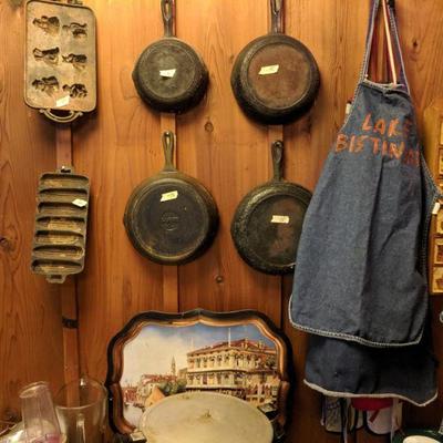 Cast iron pans and handmade aprons