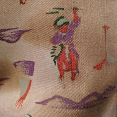 Vintage canvas fabric with native American designs. 