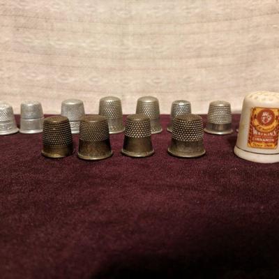 Variety of vintage sewing thimbles