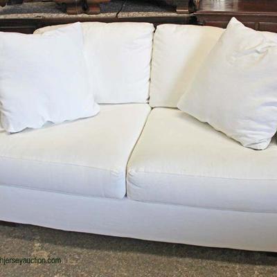  NEW Upholstered White Sofa with Pillows

Auction Estimate $100-$300 â€“ Located Inside 
