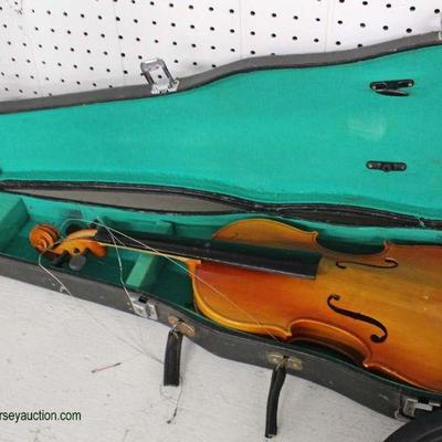  Selection of Musical Instruments including Violins, Banjos, Electric Keyboards and Others

Auction Estimate $50-$200 â€“ Located Inside 