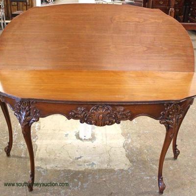  BEAUTIFUL French Style Burl Mahogany and Inlaid Carved Flip Top Extension Table

Auction Estimate $200-$400 â€“ Located Inside 