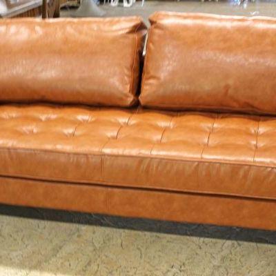  NEW Modern Design Button Tufted Leather Sofa in the Saddle Brown

Auction Estimate $300-$600 â€“ Located Inside 