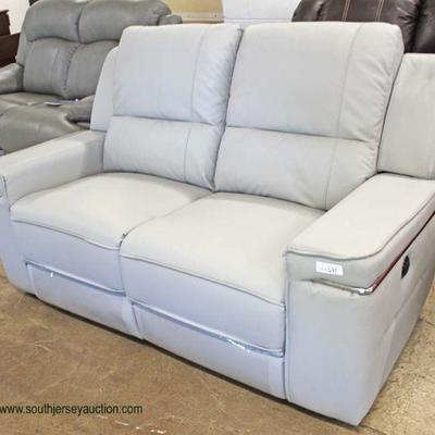  NEW Soft Grey Double Power Recliner Loveseat

Auction Estimate $300-$600 â€“ Located Inside 