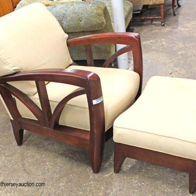  2 Piece Modern Design Arm Chair and Footstool in a Mahogany Frame

Auction Estimate $100-$300 â€“ Located Inside 