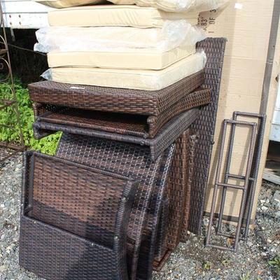  NEW Wicker Patio Set (you put together â€“ some pieces still in box)

Auction Estimate $100-$400 â€“ Located Inside 
