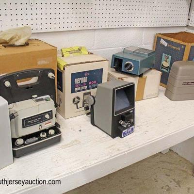  Selection of Vintage Bell & Howell and Honeywell Elmo Projectors, Vernon Movie Editor and Players

Located Glassware â€“ Auction...