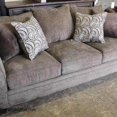 NEW Upholstered Tan Sofa with Decorative Pillows

Auction Estimate $300-$600 â€“ Located Inside 