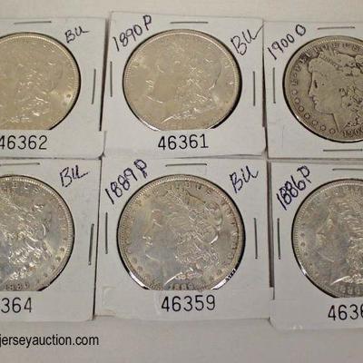  6 Silver US Dollars including 1886-P, 1890-P, 1900-O, 1889-P

Located Showcase â€“ Auction Estimate $20-$60 each 