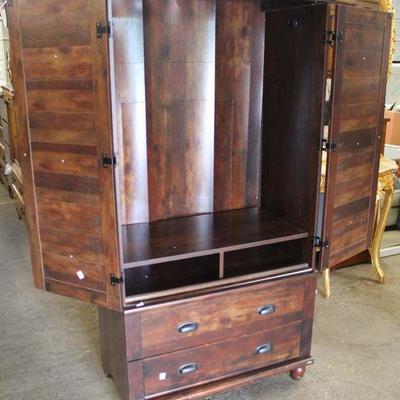  NEW Louver Door Armoire in the Mahogany Finish

Located Inside â€“ Auction Estimate $100-$300

  