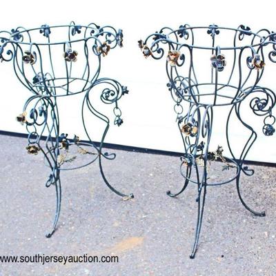  Pair of Outdoor Metal Flower Planters with Hand Painted Decorative Flowers

Auction Estimate $200-$400 each â€“ Located Out Front 