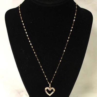  10 Karat Yellow Gold Necklace with Heart Pendant with Diamonds

Auction Estimate $100-$300 â€“ Located Inside 