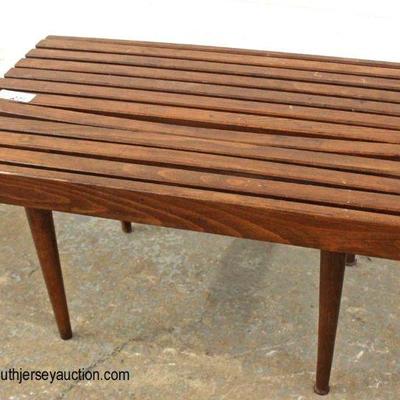  Mid Century Modern Slat Table in the Walnut

Auction Estimate $100-$300 â€“ Located Inside 
