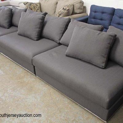  NEW Grey Upholstered Modular Sofa with Pillows

Auction Estimate $200-$400 â€“ Located Inside 
