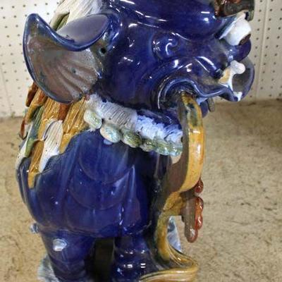  PAIR of Porcelain Foo Dogs  (approximately 30â€ high)

Auction Estimate $300-$600 â€“ Located Inside 