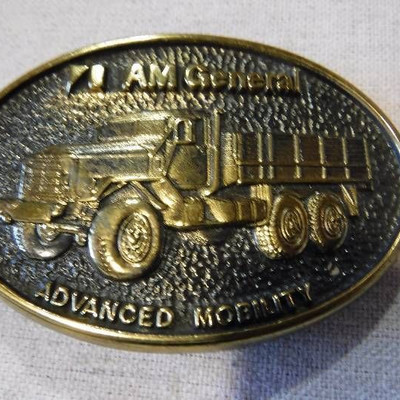 AM General belt buckle with truck on it