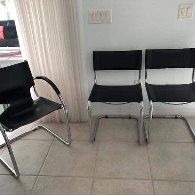 - 4 Chrome/Black Vinyl Chairs - 2 Side $18 EACH / 2 Arm $15 EACH (Some wear and tear) 