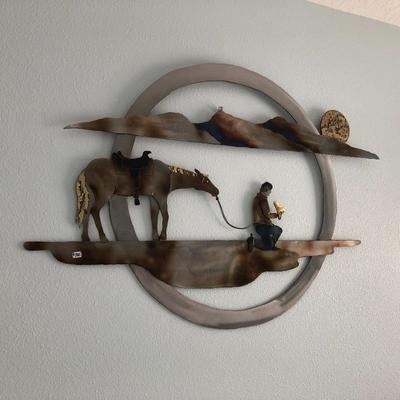 Large, quality, burnished metal wall sculpture.