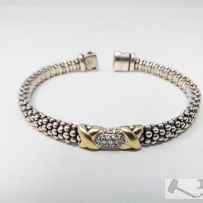 866: Lagos 18k gold with Diamonds Sterling Silver Braclet
Lagos 18k gold with Diamonds Sterling Silver Bracelet. Weighs approx. 24g....