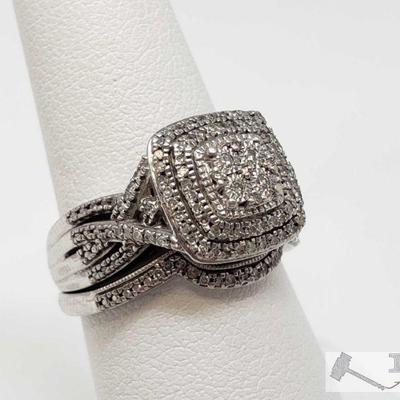 910: Sterling Silver Diamond Ring with Matching Band, 6.2g
Combined weigh approx 6.2g, size 7
OS19-017630.70