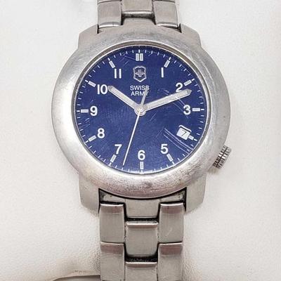 976 	
Swiss Army Victorinox Watch with Blue Face
Model V7-00 Basic