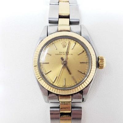 952: 	
Ladies Rolex Watch
Face stamped 466, Band Stamped 14E 78343