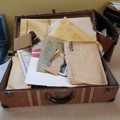 809Vintage suitcase full of war letters and newspapers
Vintage suitcase full of war letters and newspapers