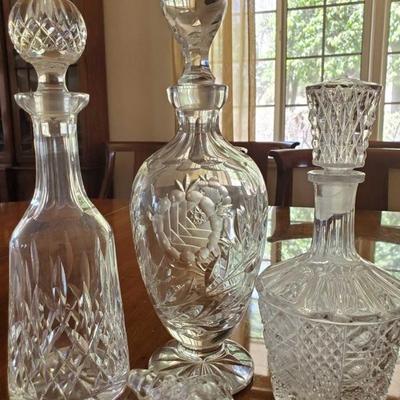 202	
3 Beautiful Glass Decanters with an extra topper
3 Beautiful Glass Decanters with an extra topper. One topper does not come off....