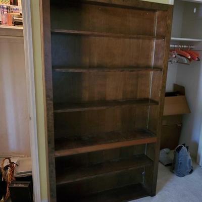 801: 
Tall Brown Book Case
Measures 73