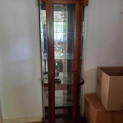 400Antique Tall Curio cabinet with light
Approximately 76