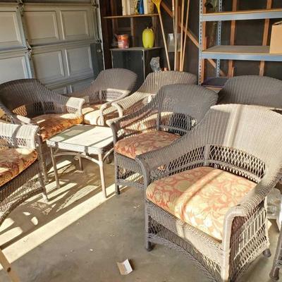 901
8 wicker patio chairs with cushion and small side table
All for one money. Approximately 34 