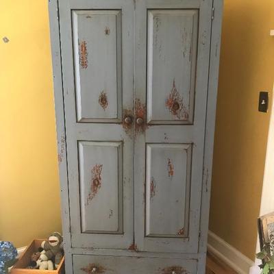 Blue painted panel cabinet