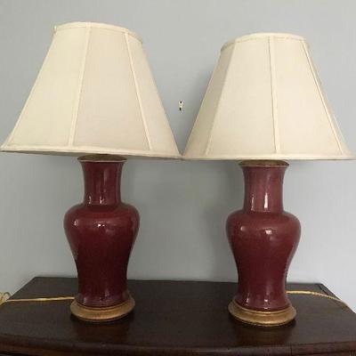 Pair of large red lamps