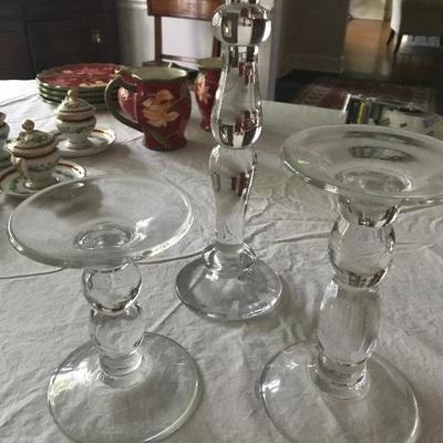 Set of three glass candlesticks