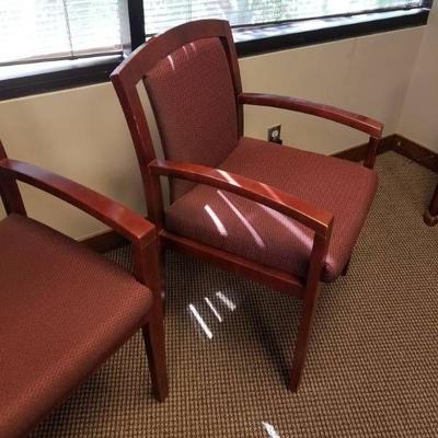 2 Maroon Office Chairs.