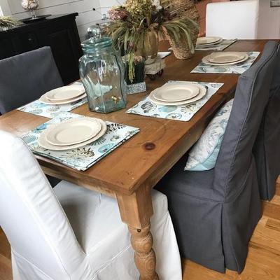 Pine farm table with drawer $$325
72 " long
rattan chair with slipcover $110 each 4 available
white slipcovered chairs $65 each 2...