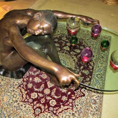Bronze sculpture cocktail table