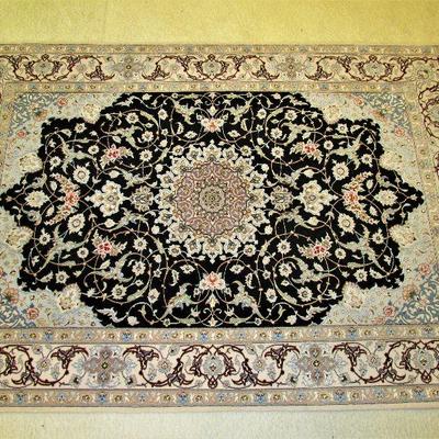 4.3x6.1 wool & silk Persian rug (BID ITEM)