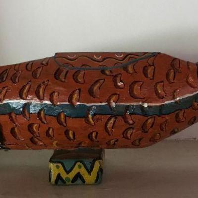 Carved primitive painted fish