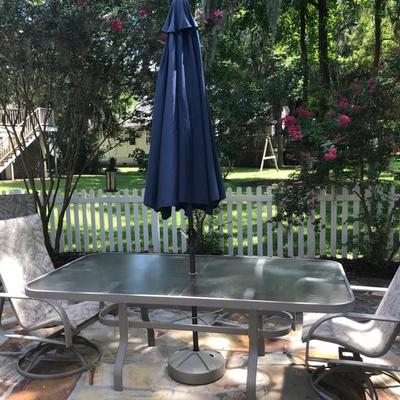 Table, umbrella, and 4 chairs $150