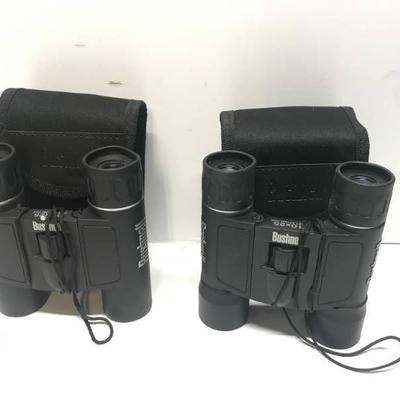 Lot of 2 Bushnell 10x25 and 12x25 binoculars