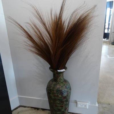 Brown and green colored metal floor vase with faux ...