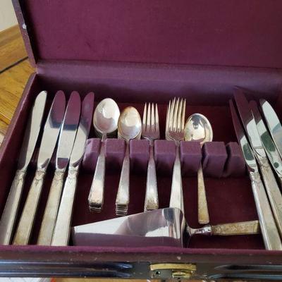 Towle sterling flatware for eight. More serving pieces were found since this photo was taken.