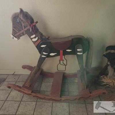  1016: Large Wooden Rocking Horse and Small one
Measures 43
