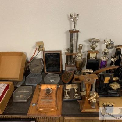 811: Vintage trophies, plaques and Dentyne gum
Vintage trophies, plaques and Dentyne gum