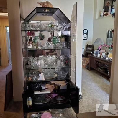 1005: Large Curio cabinet full of Crystal, And collectibles glassware
You get both the curio cabinet and the collectibles take only what...