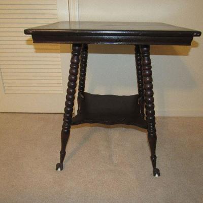 Antique table with glass ball feet