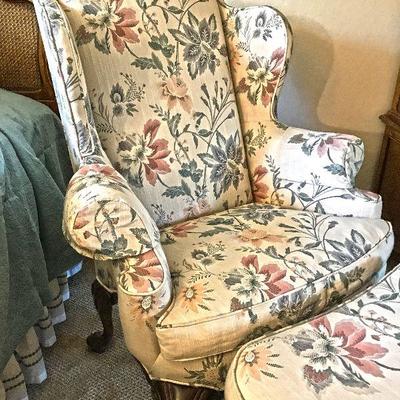 Reupholstered sitting chair with ottoman. $100