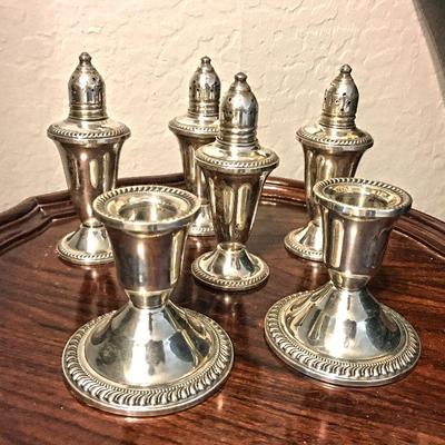 Weighted Sterling Silver candle stick holders ($28 for set) and salt and pepper shakers ($38 per set)