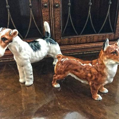 Royal Doulton Rough Haired Terrier $50. Royal Doulton Welsh Corgi Champ-Spring Robin $100.
